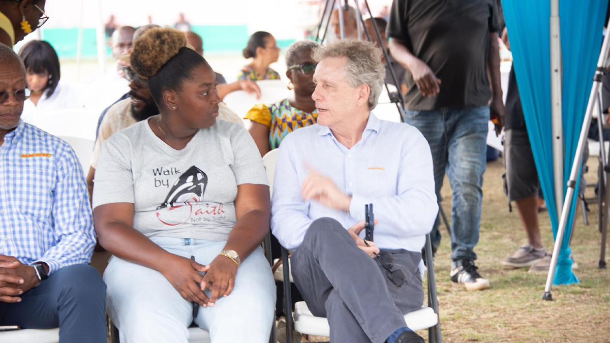 Rainforest Caribbean CEO Brian Jardim with Vincentian artist Julaé Ross 